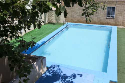 2 piscina del colegio entrenaranjos international school